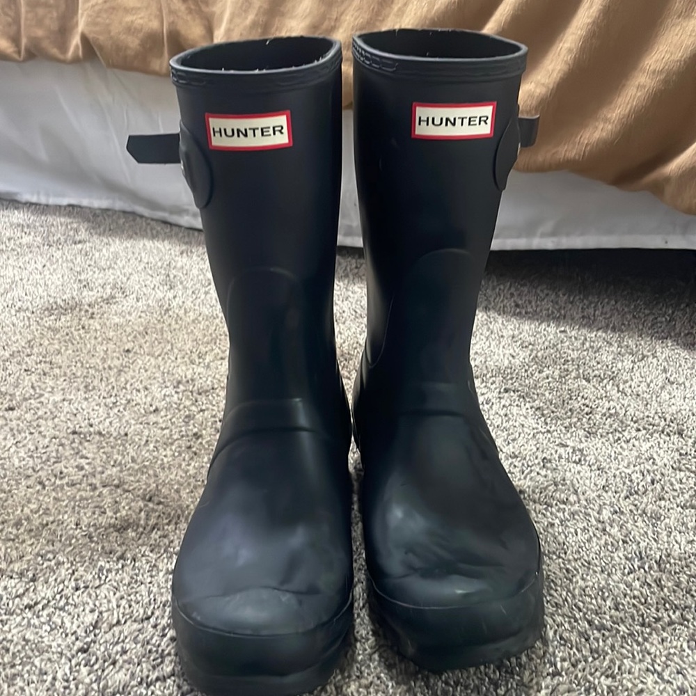 Hunter rain boots.